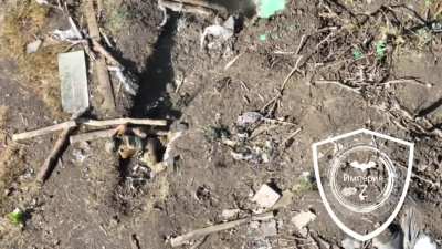 A Ukrainian soldier approaches and fires at a Russian soldier in a dugout, the Russian shoots back hitting the Ukrainian multiple times but thanks to his body armor he manages to retreat to a close friendly position, Zaporizhzhia Oblast