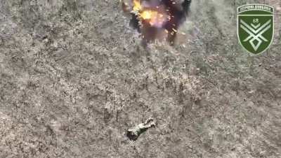 Ukrainian drone drops grenade on Russian soldier, causing a big burst of flames to explode out from his backside