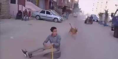 Tire surfing behind a car