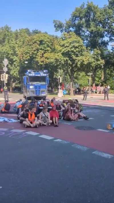 German police using water cannon against climate protestors