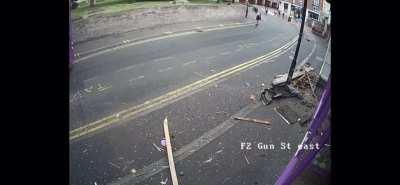 British man gets wiped out by bus then gets straight up and proceeds to enter the pub like it was nothing