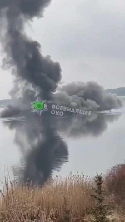 Ukrainian military shot down a Russian helicopter and the pilot is seen parachuting out