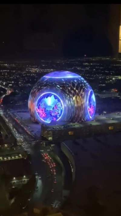 The Sphere at The Venetian Resort in Paradise, Nevada, has an exosphere made of LED light panels which is visible from several miles away. 
It's being tested in these days and it's quite stunning