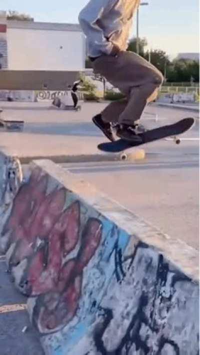 Skateboarding over a Jersey barrier