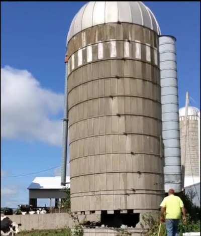 Watching this silo collapse