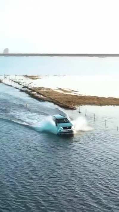 Would you Drive across this flooded road in Iceland?