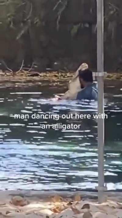 Man dancing with Alligator? Really that's all that needs to be said.