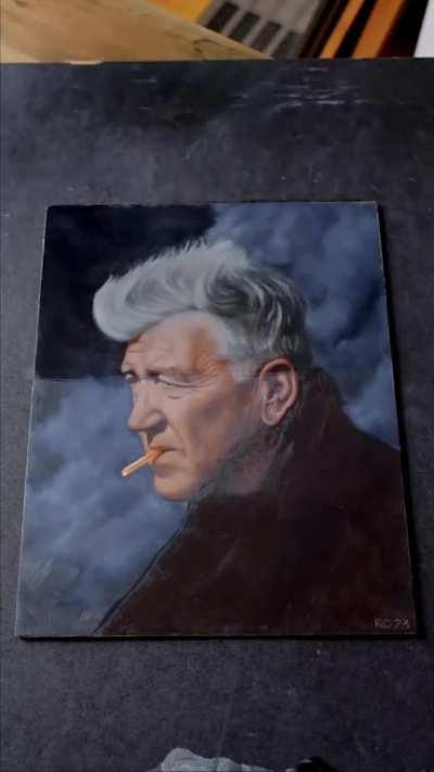 Varnishing a David Lynch portrait by Randy Ortiz