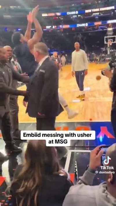 Joel Embiid and 76ers staff legitimately harassing this MSG security guard doing his job is embarrassing. Taking shots while being OUT-OF-BOUNDS and the security guard somehow gets blamed.