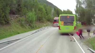 Kids cross the street without looking.