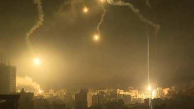 Flares and airstrikes lighting up the Gaza skyline tonight