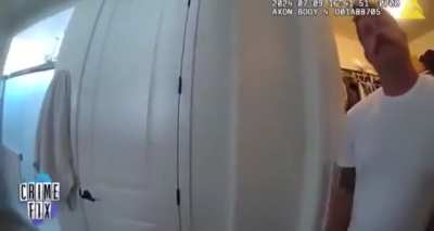 Police bodycam footage shows 37-year-old Christopher Scholtes moments after learning that his 2-year-old daughter had died after being left in a hot car in 109°F heat.