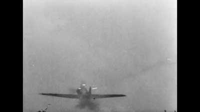 Hawker Hurricane landing gear drops under fire from a Messerschmitt Bf 109