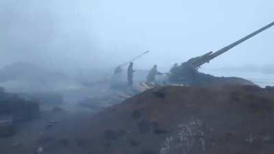 Ukrainian artillery battery sends rounds downrange towards separatist positions near Debaltseve - 2015