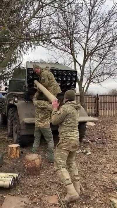 Ukrainian GRAD team load up rockets