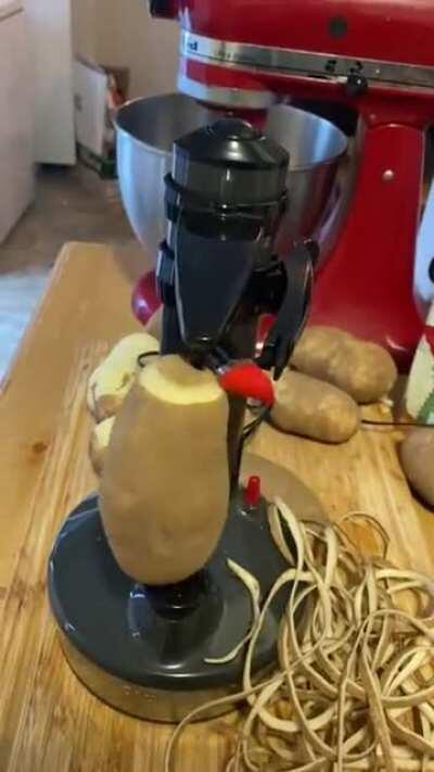 Automatic potato peeler