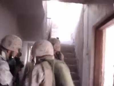 US Marines from the 3rd Battalion, 3rd Marines clear a building in Fallujah, Iraq (2007)