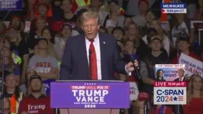 Donald Trump, GOP Presidential candidate, mimes performing oral sex on a microphone at his campaign rally