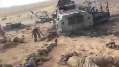 Mali desert: Wagner PMC mercenary fakes being dead, gets caught, then tries to fight armed Tuareg with a stone. Gets shot from with AKs from close. 