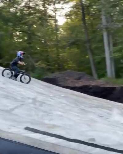 This 9 year old landed a double back-lit on his bike!