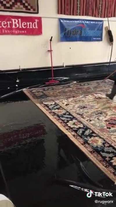 This rug getting cleaned looks like new