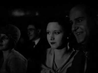 People in silent movies watching movies