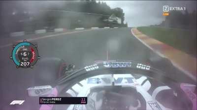 Checo Perez drifting an F1 car at 200+ km/h in the rain