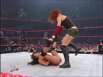 Lita stomps and headbutts Gail Kim's crotch