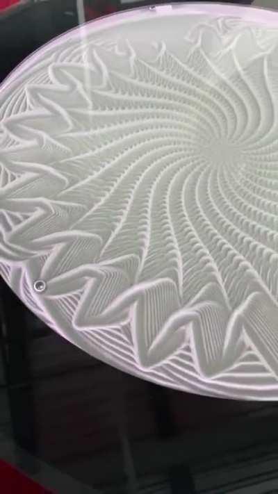 This table uses magnets and kinetic sand to create unique patterns