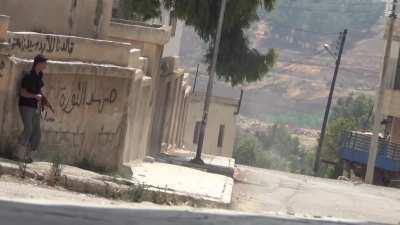 Both sides visible as Syrian Army soldiers and Opposition fighters trade rifle fire around corners - June 2012