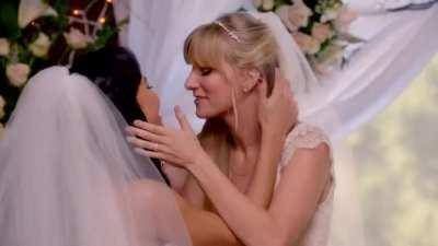 Naya Rivera and Heather Morris kiss in “Glee”