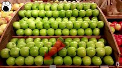 Perfectly stacked piles of fruits and vegetables…