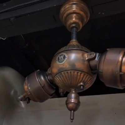 A Gyro ceiling fan (having a Copper Oxide finish) built by Westinghouse in 1920.