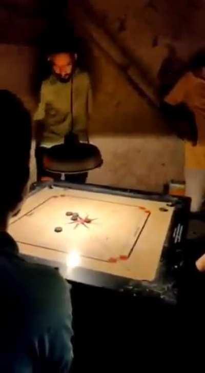 Casually winning a game of carrom with no hands