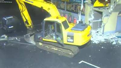 Guy steals ATM with Excavator