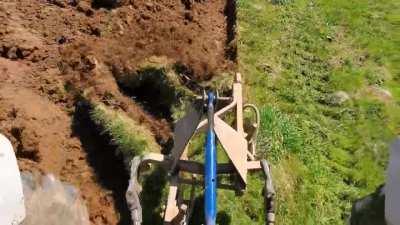 plowing under a hay field with old(er) technology.