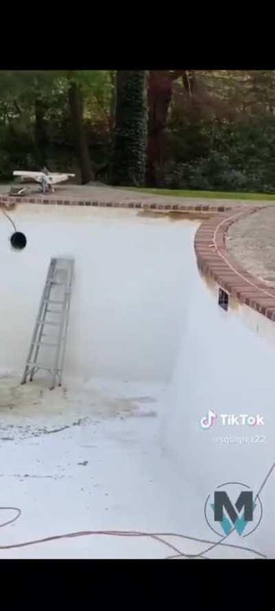 Satisfying video of a pool being cleaned that hasn't been used in 11 years