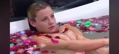 Rachal Burns on Aussie Big Brother drunkenly using her tits to flirt with a man who's cluelessly reading her shampoo instructions.