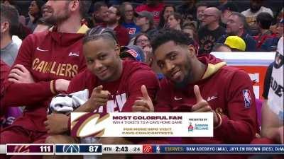 Isaac Okoro and Donovan Mitchell smiling to the camera