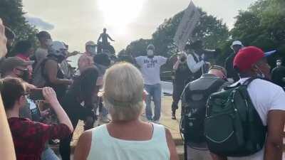 Black tourguide calls out the crowd planning to tear down the Emancipation Memorial in DC for not understanding its history