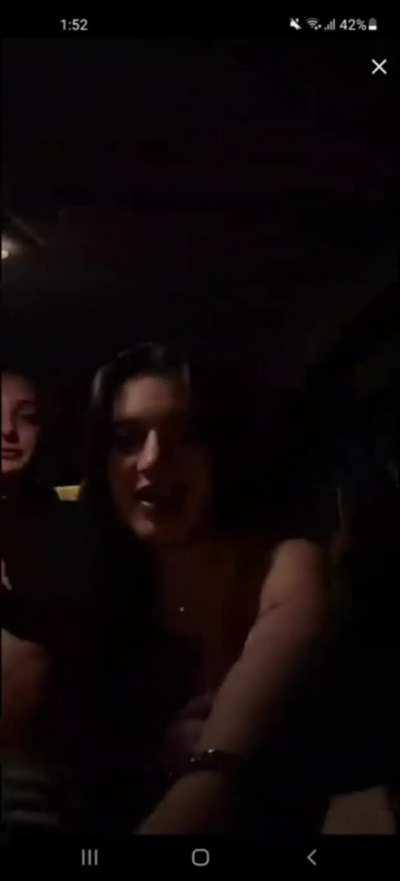 two Latinas in a car