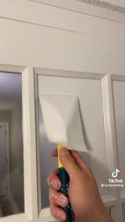 Removing paint from glass