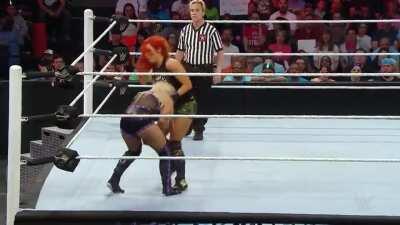 Becky Lynch kicks Dana Brooke low