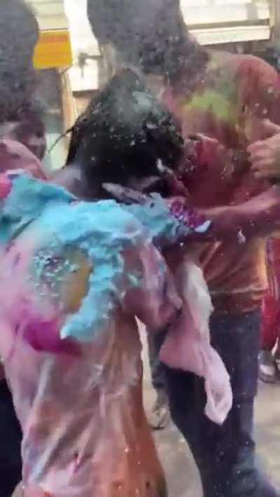 Japanese girl gets physically harassed, egged and grabbed by locals during Holi celebrations in India