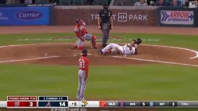 Braves Catcher Travis D'Arnaud is hit by a pitch and 