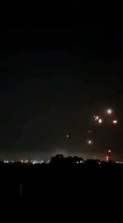 Incredible footage of a rocket barrage launching from Gaza, and being intercepted by the Iron Dome