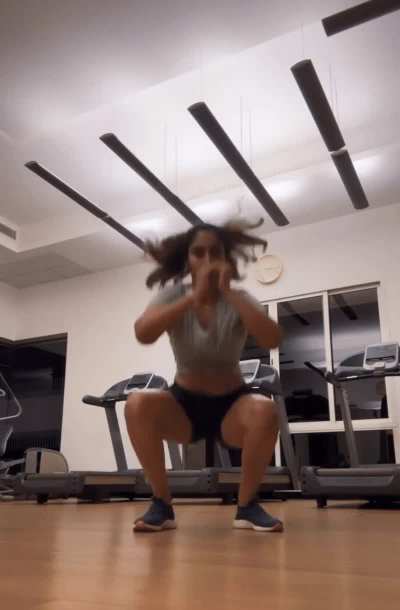 Reba Monica John in grey gym top and shorts