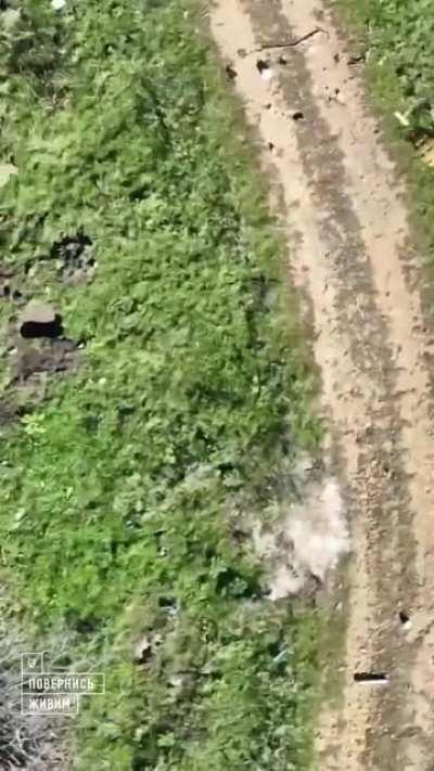 A Ukrainian drone dropping grenades on Russian infantry and mortar crews