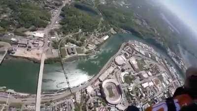 Navy SEALS parachute into football stadium