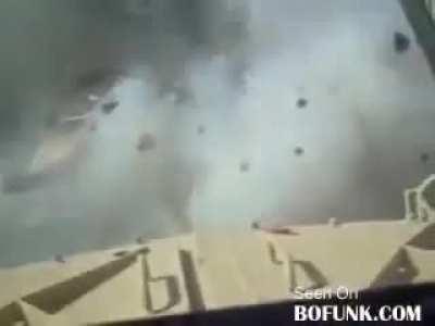 US Marine Corps Abrams tank runs over a VBIED in Iraq. (Hatch is open, tank and crew were fine)